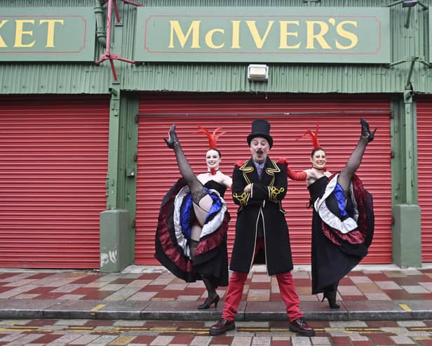MC Puppet Paul and Can Can dancers, Amy Espie and Amber Dollin ahead of the Moulin Rouge event at the Barras Market.