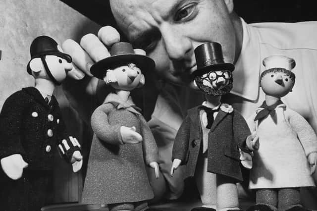 Windy Miller, second left, with PC McGarry, Dr Mopp and Mickey Murphy during the filming of Camberwick Green in 1965 (Picture: Keystone/Hulton Archive)