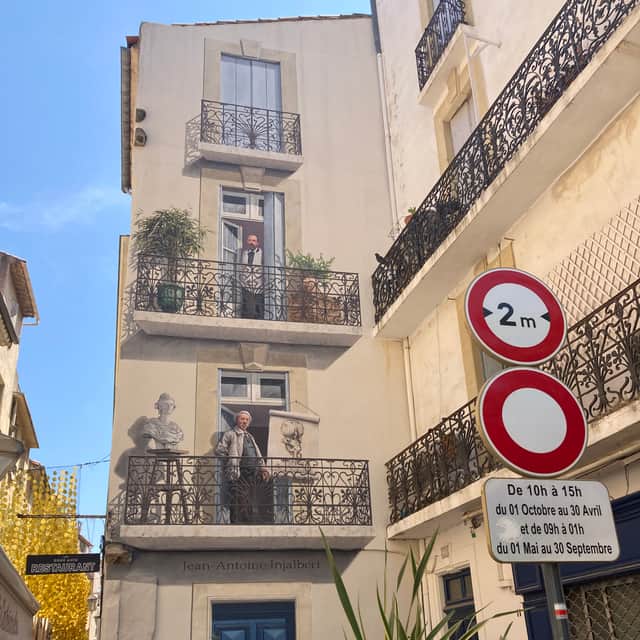 A mural by local sculptor Jean-Antoine Injalbert on a building in Béziers.
