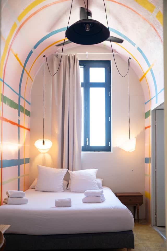 A bedroom in one of the former cells at Hôtel La Prison, Béziers.