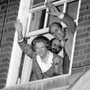 Margaret Thatcher and Norman Tebbit waves to the crowds from Conservative Central Office after the Conservatives won the 1987 general election (Picture: Rebecca Naden)