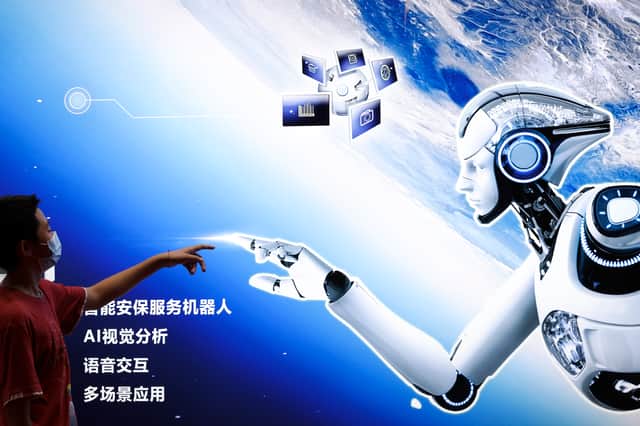 Artificial intelligence, whether in robot form or not, is increasingly becoming part of our lives (Picture: Lintao Zhang)