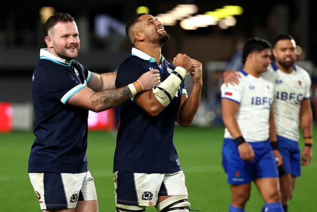 Ewan Ashman and Andy Onyeama-Christie celebrate Scotland's 41-12 win over Samoa at Eden Park in Auckland.