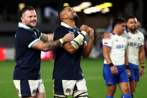 Ewan Ashman and Andy Onyeama-Christie celebrate Scotland's 41-12 win over Samoa at Eden Park in Auckland.