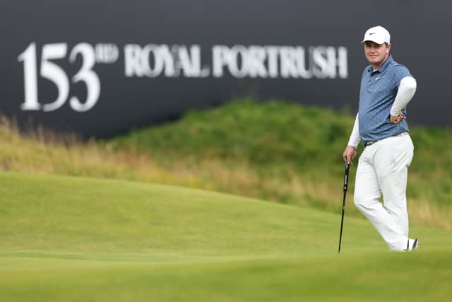 A content-looking Bob MacIntyre looks on from the 18th green during day two of The 153rd Open Championship at Royal Portrush 