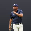 Bryson DeChambeau acknowledges the crowd on the 18th green during day two of The 153rd Open Championship 