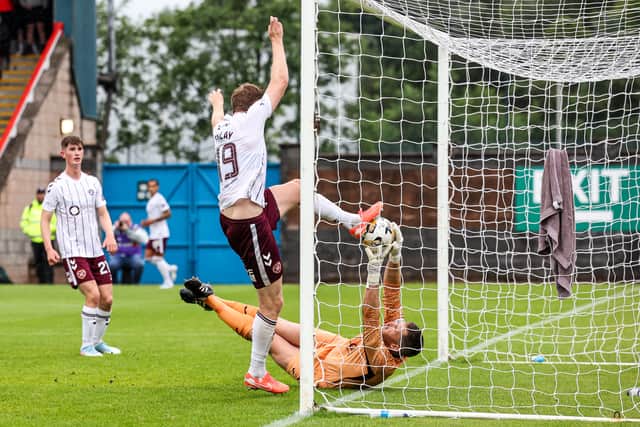 Stuart Findlay scores Hearts' fourth goal at Forthbank.