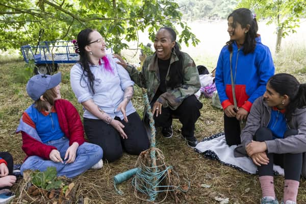Television presenter and newly appointed Girlguiding ambassador Angellica Bell (centre) participates in making bug hotels for the new Entomology badge with Guides to mark the launch of 72 new interest badges available to girls throughout the youth organisation