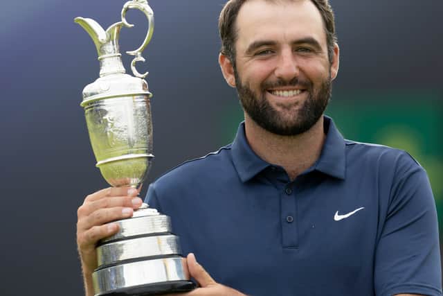 Scottie Scheffler holds the Claret Jug after winning the 153rd Open Championship at Royal Portrush