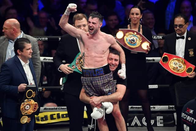 Josh Taylor celebrates his victory over Jack Catterall during the WBA, WBC, WBO & IBF world super-lightweight title fight at the OVO Hydro, on February 26, in Glasgow, Scotland. (Photo by Paul Devlin / SNS Group)