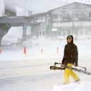 A skier on the way to the slopes at Glenshee, January 2025