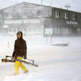 A skier on the way to the slopes at Glenshee, January 2025