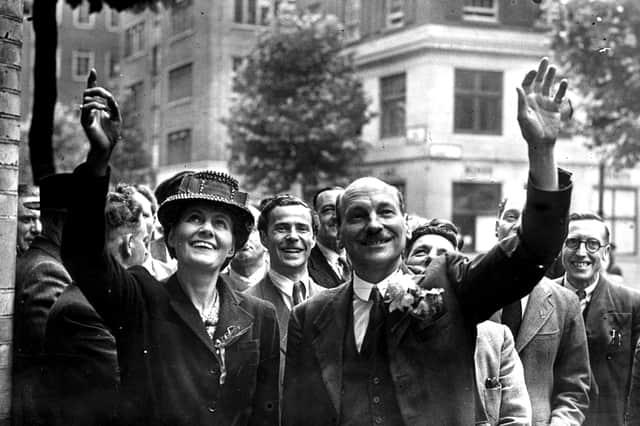Clement Attlee and his wife Violet wave to crowds in London in July 1945 after Labour won the election earlier that month (Picture: Keystone)