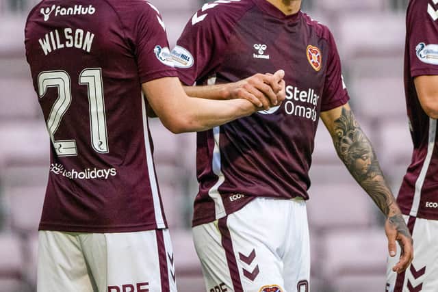 Hearts' Alexandros Kyziridis celebrates with James Wilson (L) after making it 3-0 over Dumbarton at Tynecastle. (Photo by Paul Devlin / SNS Group)