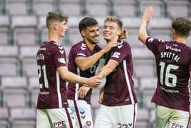 Claudio Braga (second from left) celebrates with James Wilson, Adam Forrester and Blair Spittal after making it 4-0 to Hearts over Dumbarton at Tynecastle. (Photo by Paul Devlin / SNS Group)