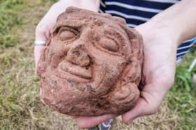 The carved head found at Skaill Farm, Westness,  Isle of Rousay, Orkney. PIC: UHI Archaeology Institute.
