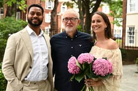 Jeremy Corbyn poses with a couple about to get married at Islington Town Hall after he announced the creation of a new left-wing political party (Picture: Leon Neal)