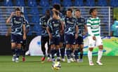 Celtic shipped five goals to Ajax on the banks of Lake Como.
