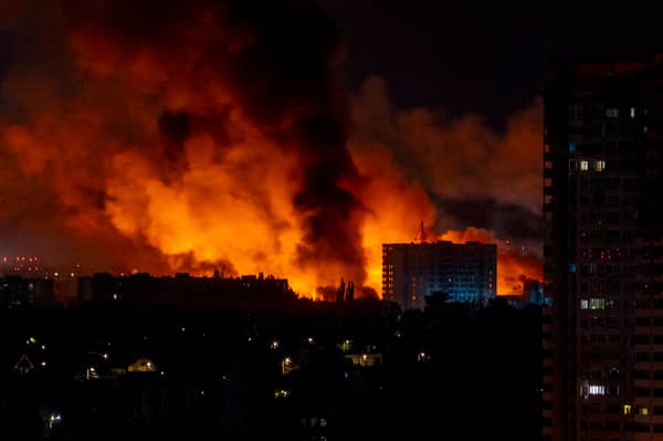 Huge clouds of smoke and flames rise into the night sky over Kyiv during mass Russian drone and missile strikes earlier this month (Picture: Oleksii Filippov)