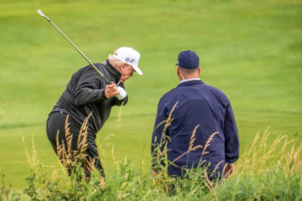 Donald Trump gets in a round of golf at Trump Turnberry following his arrival in Scotland (Picture: Christopher Furlong)