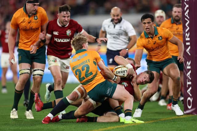 Huw Jones of the British & Irish Lions scores a first-half try during the second Test of the series against Australia.