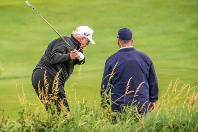 Donald Trump gets in a round of golf at Trump Turnberry following his arrival in Scotland (Picture: Christopher Furlong)