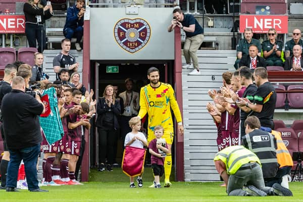 Hearts' Craig Gordon receives a guard of honour as he walks out for his a testimonial match between Hearts and Sunderland at Tynecastle. Cr: SNS Group.