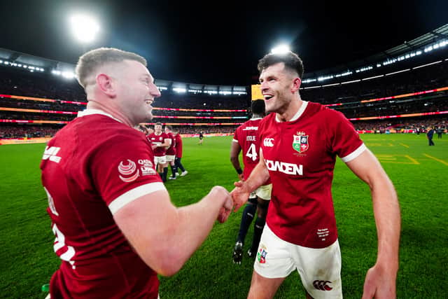 Finn Russell and Blair Kinghorn celebrate the Lions' series victory following the 29-26 win over Australia in the second Test at the Melbourne Cricket Ground.