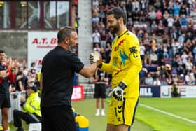 Hearts' Craig Gordon (R) and head coach Derek McInnes (L) shakes the hand of Craig Gordon following his testimonial game against Sunderland.