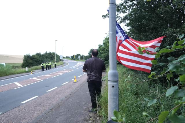 A lone Trump supporter awaiting the US President's arrival into Turnberry