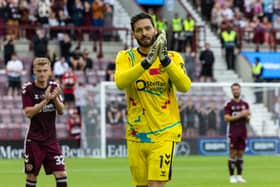 Hearts goalkeeper Craig Gordon applauds the fans as he is substituted after 30 seconds during his testimonial match against Sunderland at Tynecastle. (Photo by Mark Scates / SNS Group)