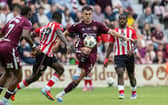 Hearts' Oisin McEntee (R) and Sunderland's Habib Diarra (L) in action during a testimonial match for Craig Gordon's Testimonial at Tynecastle.