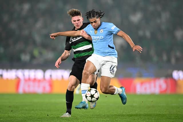 Celtic target Jahmai Simpson-Pusey of Manchester City holds off Viktor Gyokeres of Sporting CP during a Champions League match last season. (Photo by Justin Setterfield/Getty Images)