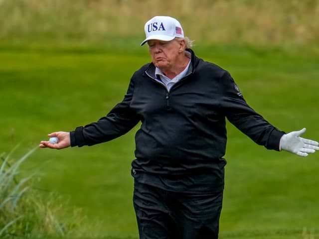 Donald Trump plays a round of golf at the Trump Turnberry course (Picture: Christopher Furlong)