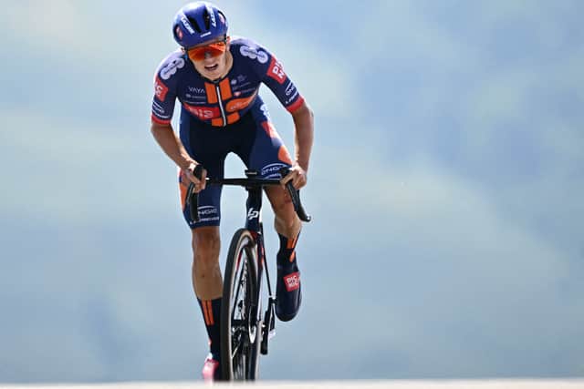 Oscar Onley cycles to the finish line of the 13th stage of the Tour de France, a 10.9km individual time trial between Loudenvielle and Peyragudes, in the Pyrenees.
