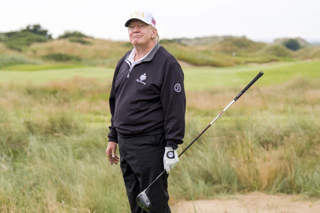 US President Donald Trump, on the first tee during the official opening of the New Course, the second championship course at Trump International Golf Links, on the Menie Estate in Balmedie, Aberdeenshire