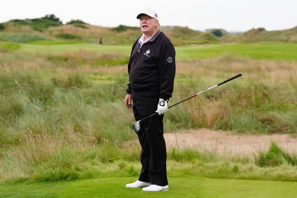 US President Donald Trump attends the opening of the Trump International Golf Links, the president's new golf course on the Menie Estate in Balmedie, Aberdeenshire. Picture: Jane Barlow/PA Wire