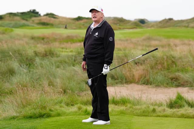 US President Donald Trump attends the opening of the Trump International Golf Links, the president's new golf course on the Menie Estate in Balmedie, Aberdeenshire. Picture: Jane Barlow/PA Wire