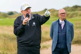 US President Donald Trump with CEO of DP World Tour Guy Kinnings (right) on the first tee of the New Course, the second championship course at Trump International Golf Links, on the Menie Estate in Balmedie, Aberdeenshire. Picture: Jane Barlow/PA Wire