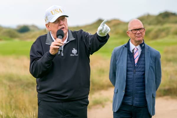 US President Donald Trump with CEO of DP World Tour Guy Kinnings (right) on the first tee of the New Course, the second championship course at Trump International Golf Links, on the Menie Estate in Balmedie, Aberdeenshire. Picture: Jane Barlow/PA Wire