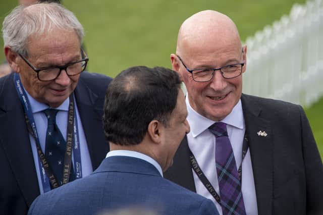 John Swinney chatting with Anas Sarwar