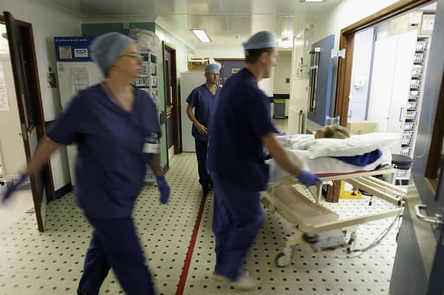 Hard-pressed NHS staff know how the system is supposed to work and the reality of long waiting lists for treatment (Picture: Christopher Furlong)