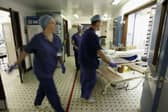 Hard-pressed NHS staff know how the system is supposed to work and the reality of long waiting lists for treatment (Picture: Christopher Furlong)