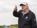 US President Donald Trump on the first tee during the official opening of the New Course, the second championship course at Trump International Golf Links, on the Menie Estate in Balmedie, Aberdeenshire