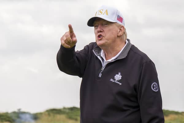 US President Donald Trump on the first tee during the official opening of the New Course, the second championship course at Trump International Golf Links, on the Menie Estate in Balmedie, Aberdeenshire