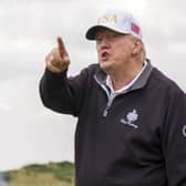US President Donald Trump on the first tee during the official opening of the New Course, the second championship course at Trump International Golf Links, on the Menie Estate in Balmedie, Aberdeenshire