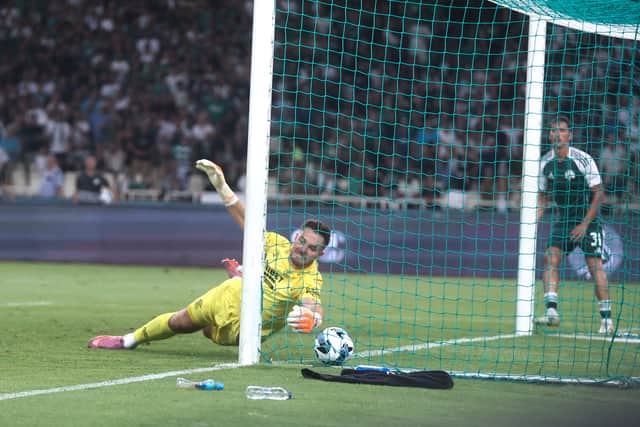 Jack Butland is unable to stop Panathinaikos taking the lead.