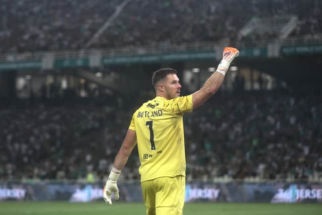 Rangers goalkeeper Jack Butland celebrates the 1-1 draw in Athens against Panathinaikos.