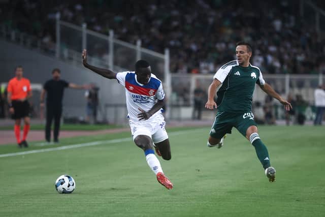 Mohamed Diomande tries to drive Rangers forward in Greece.