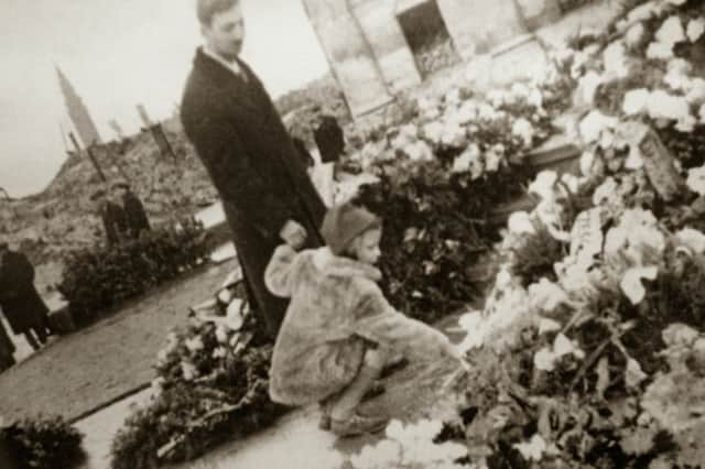 Marek Edelman, who lived until 2009, lays flowers on the ruins of the Warsaw Ghetto in 1945 (Picture: Laski Diffusion)